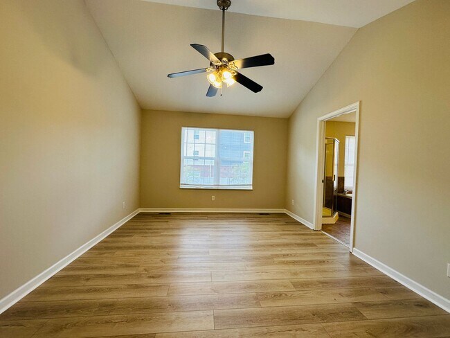 Building Photo - 2 bed, 2.5 bath updated townhouse w/ 1-car garage & Trex deck available now