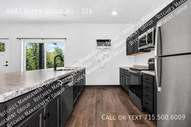Building Photo - 8687 Aspen Ln