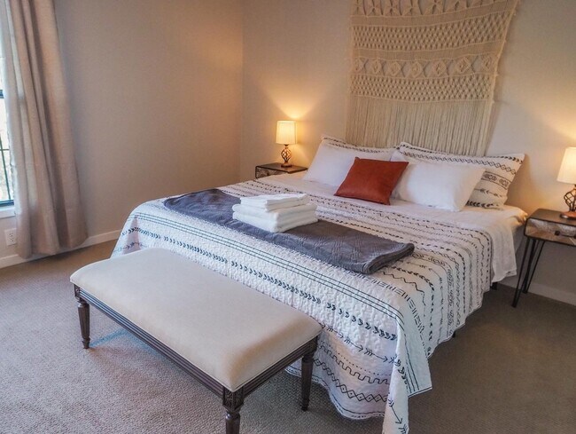 Bedroom 1: King bed with private bathroom, two nightstands, closet, darkening curtains, work space - 475 King St