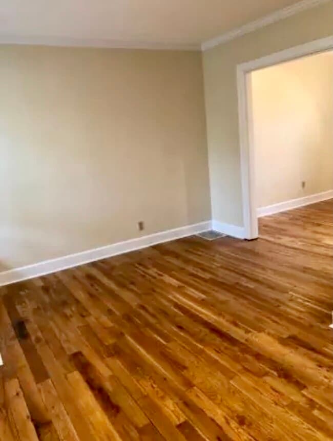 Another view of the living room, which leads to the dining room. - 1149 Cooper Dr