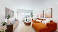 Located at The Harborside in West Sacramento, CA, this single-story, 3-bedroom, 2-bathroom home offers a thoughtfully designed open-concept layout with modern finishes throughout. Light wood-look flooring flows seamlessly across all rooms, lending warmth and continuity to the space.

The bright living room is anchored by large windows that invite abundant natural light, creating an airy, welcoming atmosphere. The contemporary kitchen features sleek white cabinetry extending to the ceiling, stainless steel appliances, a tile backsplash, recessed lighting, and a freestanding island with bar seating — ideal for casual dining and entertaining.

The primary bedroom is a comfortable retreat with a well-sized window overlooking the outdoors and access to a closet. Additional bedrooms offer similar clean, light-filled aesthetics with ample closet storage, including a walk-in configuration visible in one room.

Both bathrooms are finished in a clean, modern style with white vanity cabinetry, light countertops, and wood-look flooring. One bathroom includes a shower/tub combination, while the second provides a spacious layout with a separate shower area.

Throughout the home, crisp white walls, consistent flooring, and an understated design palette create a cohesive and functional living environment at The Harborside.