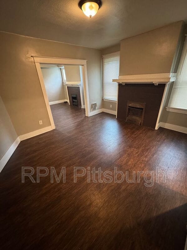 Building Photo - 311-313 W Burgess St
