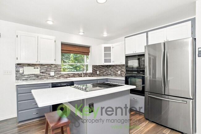 Building Photo - 6351 23rd Ave SW