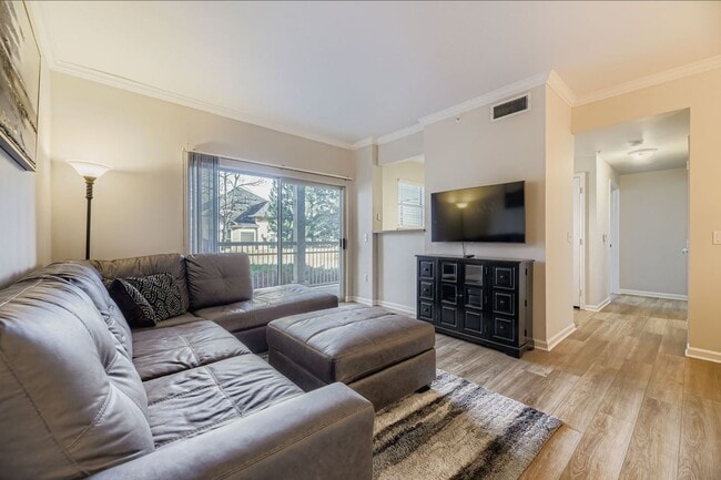 Photo - Charming 1 bed/1 bath Condo with Garage- Gated Community with Pool and Fitness Center