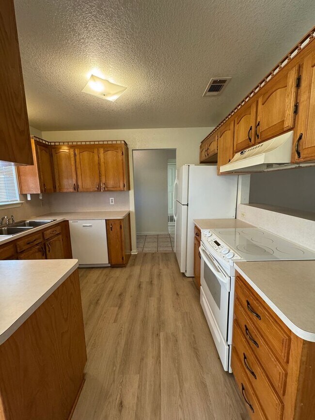 Building Photo - Charming 3-bedroom, 2-bath home offering peaceful country living on just under an acre.