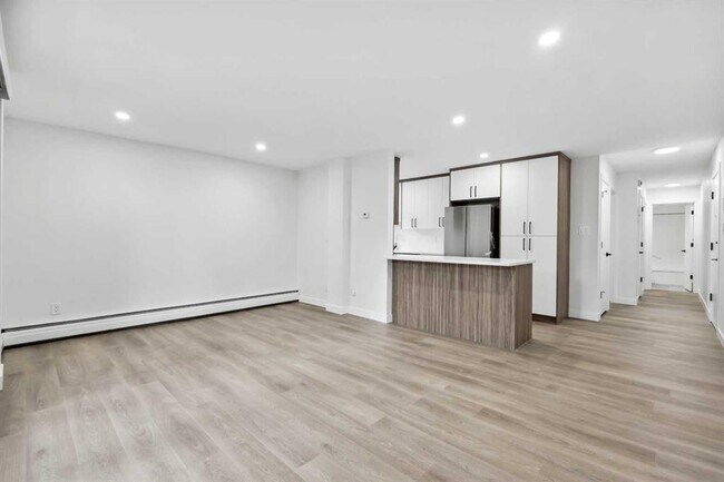 Photo du bâtiment - 110-424 24 Ave SW