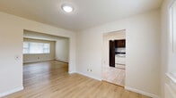 Located in Eagle Rock Village in Budd Lake, NJ, this 2-bedroom, 1-bathroom home offers a practical and well-organized single-floor layout. Light wood laminate flooring flows throughout the main living areas, creating a bright and cohesive feel, while large windows allow natural light to fill the rooms.

The living room is an open, welcoming space anchored by a large front-facing window and direct access to the entry door. It connects seamlessly to the dining room through an open archway, promoting an easy flow between the two areas. The kitchen features dark espresso cabinetry, light granite-style countertops, a mosaic tile backsplash, white appliances, and tile flooring — a functional space with a touch of contrast in its design.

The spacious primary bedroom offers ample room and includes its own closet access, while the second bedroom provides a comfortable and flexible space. A hallway connects the bedrooms, with a total of four closets distributed throughout the unit for generous storage. The bathroom is finished with pink tile wall accents, a vanity with under-sink storage, a soaking tub, and a window for natural ventilation. Baseboard heating is present throughout, ensuring consistent warmth. The overall ambiance is clean, neutral, and move-in ready.