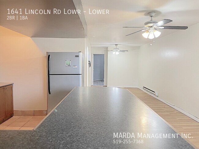 Photo du bâtiment - COZY OPEN CONCEPT 2 BED/1 BATH LOWER UNIT ...