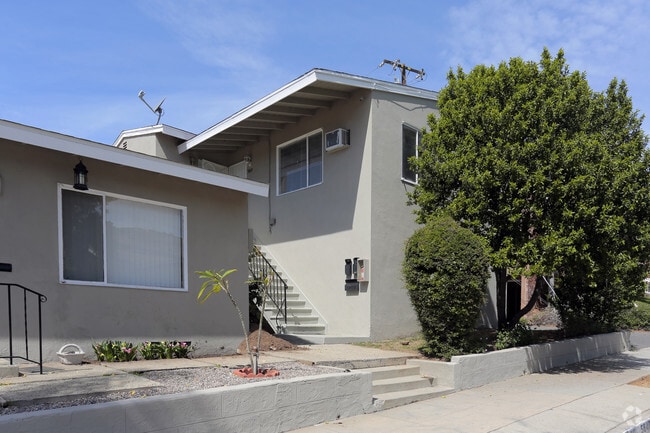 Building Photo - 5847-5859 Comstock Ave
