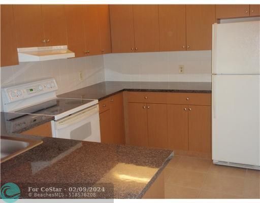 Building Photo - 11460 Royal Palm Blvd
