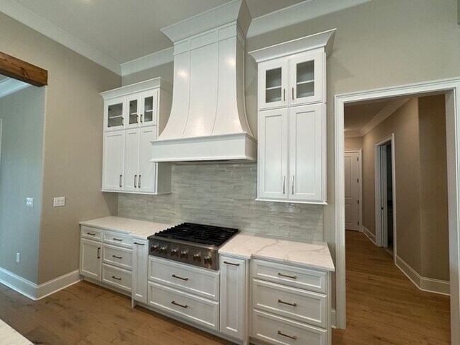 Building Photo - Rare rental opportunity in gated McMullen Cove community