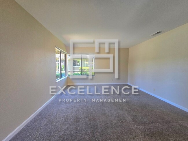 Building Photo - Single Story 2/2 with 2 Car Garage, AC, Patio, Community Pool