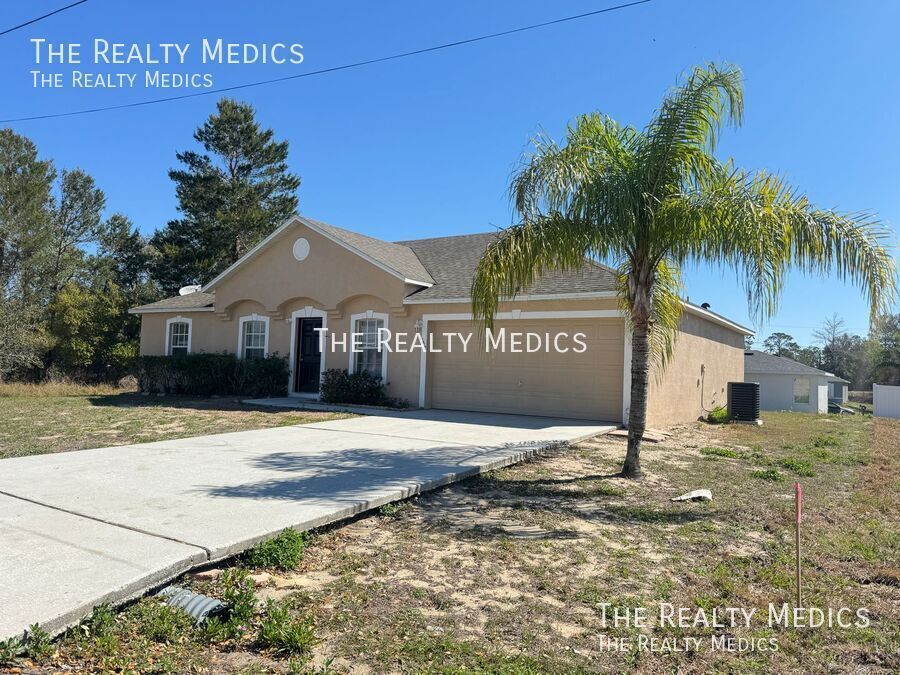 Primary Photo - Charming 3-Bedroom Home in Poinciana – You...