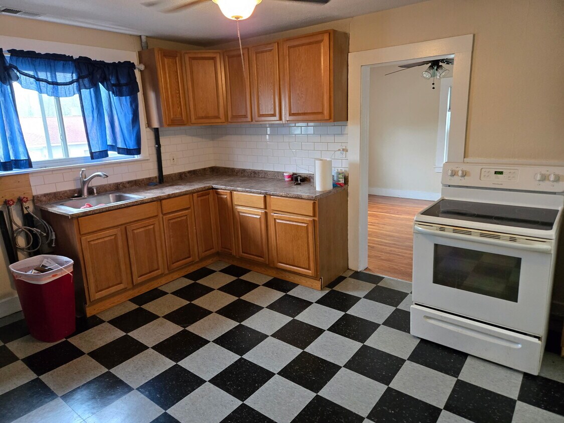 Eat in kitchen with large pantry and stack washer dryer - 119 Main St