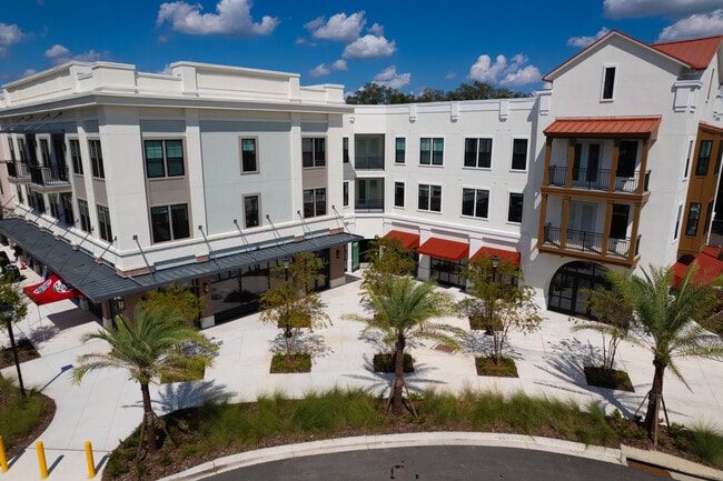 Building Photo - The Flats at Avalon Park Wesley Chapel