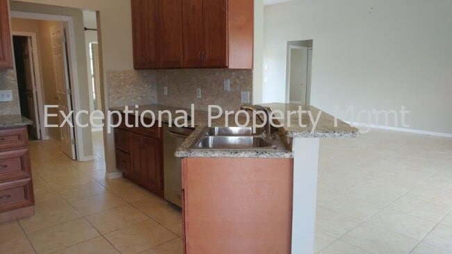 Building Photo - 3 Bed 2 Bath SW CAPE Home! Lawn Service In...