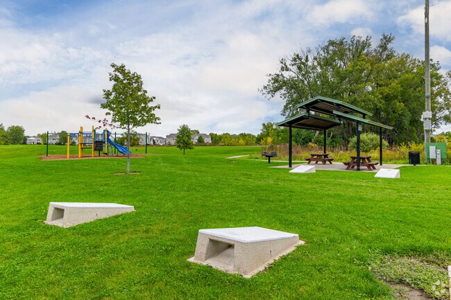 Sprenger Park is a large 40 acre park featuring various amenities, including corn hole.