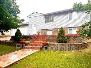 Building Photo - 12996 E Florida Dr