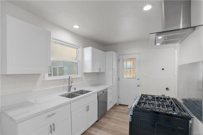 Photo - Welcome to this inviting 3 bedroom, 2 bath residence tucked away on a peaceful street in the hear... House