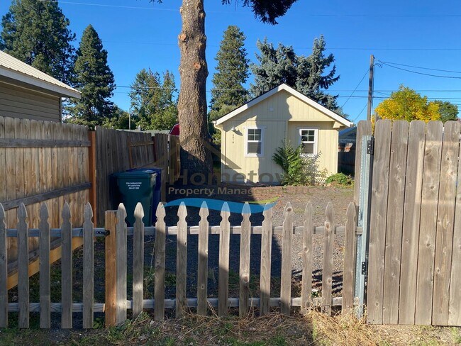 Building Photo - Studio Style Cottage w/Fenced Yard