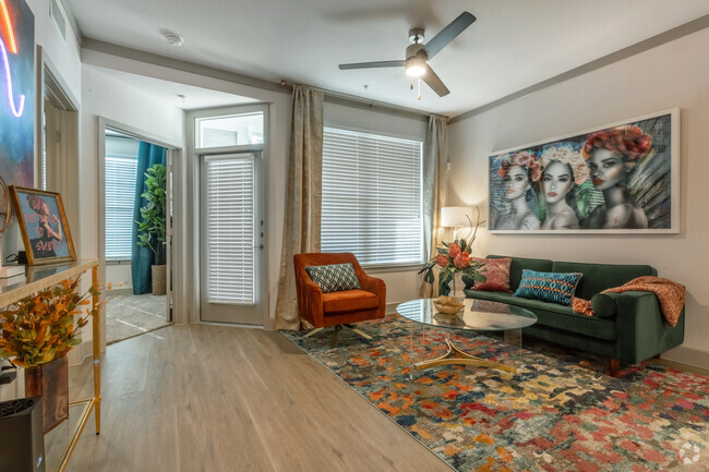 2BR, 2BA - 1,067 SF - Living Room - Evolve Champions