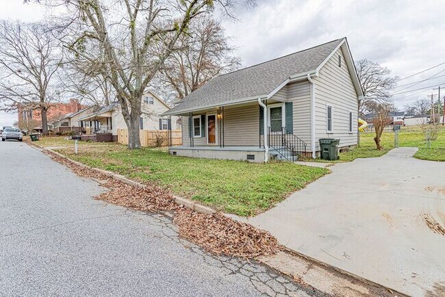 Building Photo - NEW PRICE! Not Your Typical Mill House!