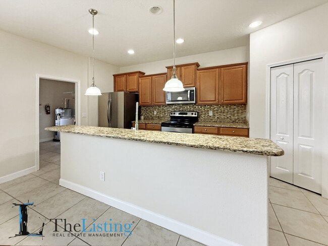 Building Photo - 9025 Savannah Julip Ln
