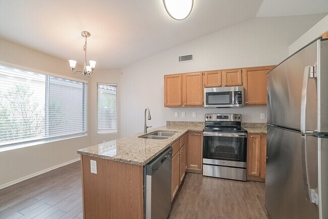 Building Photo - 655 N Rita Ln