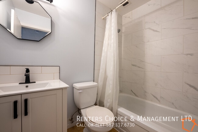 Building Photo - 1 Bedroom Condo, Assigned Parking, Utilities Included