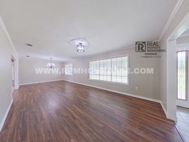 Building Photo - Spacious 4-Bedroom Home with Solar Panels ...