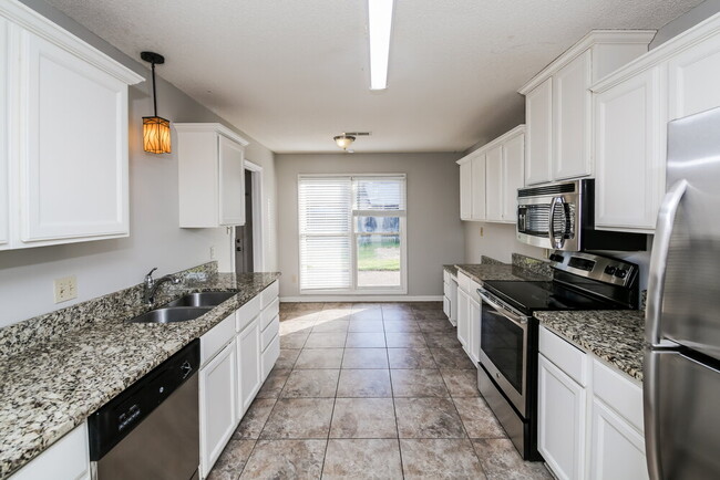 Building Photo - 9037 Fletcher Park Cove