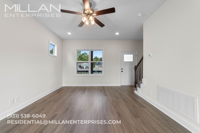 Building Photo - Spacious And Updated Home Featuring Open F...