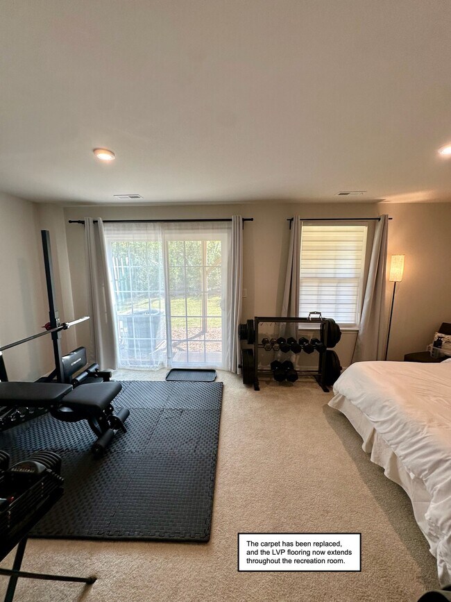 Rec room with sliding door to backyard - 4022 Edenborn Ln