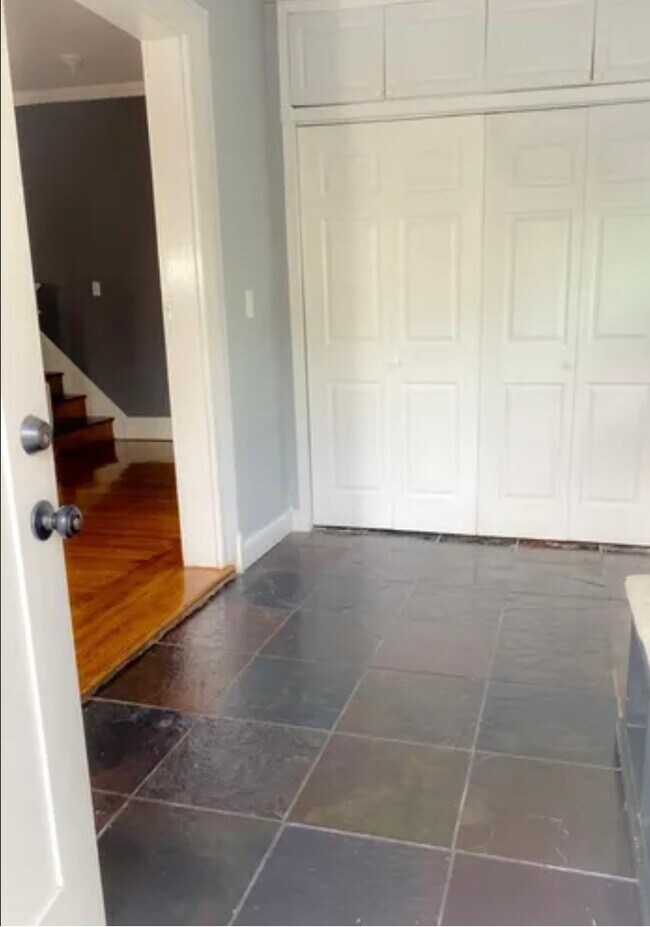 Main entrance with mud room and large closet for storage - 92 Iris Ave