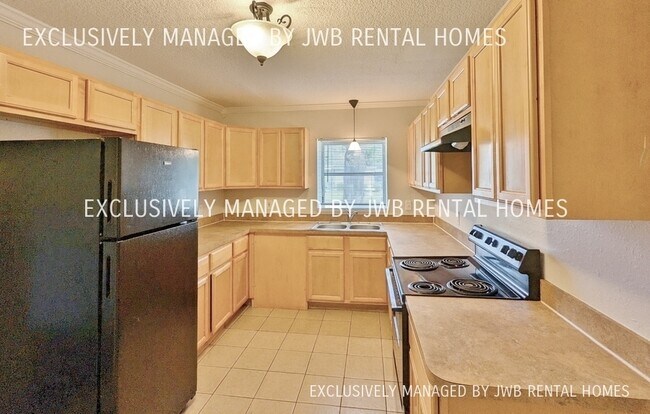 Foto del edificio - 6432 Cobalt Ave N