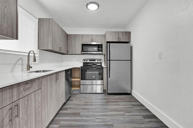 Building Photo - 5753 NW 6th Ave