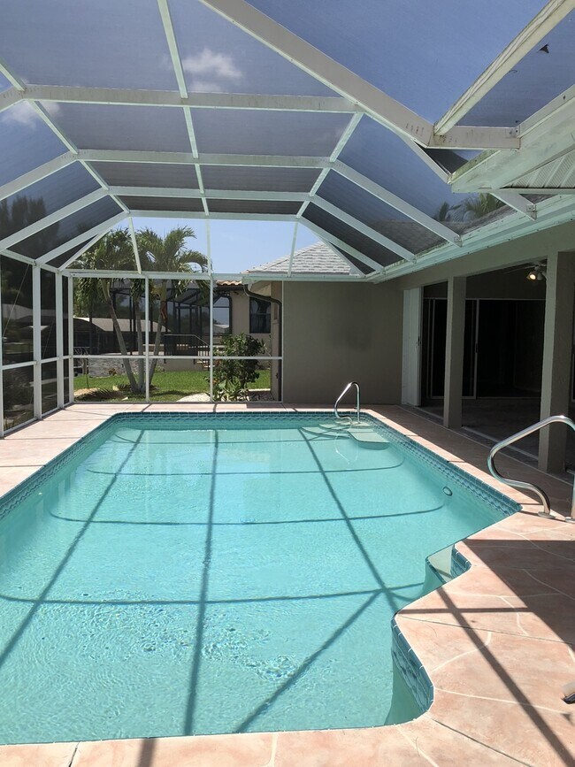Building Photo - Gulf access Pet Friendly Pool home in SW C...