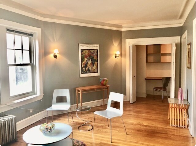 Living Room and Workspace Nook with Doors - 548 W Brompton Ave
