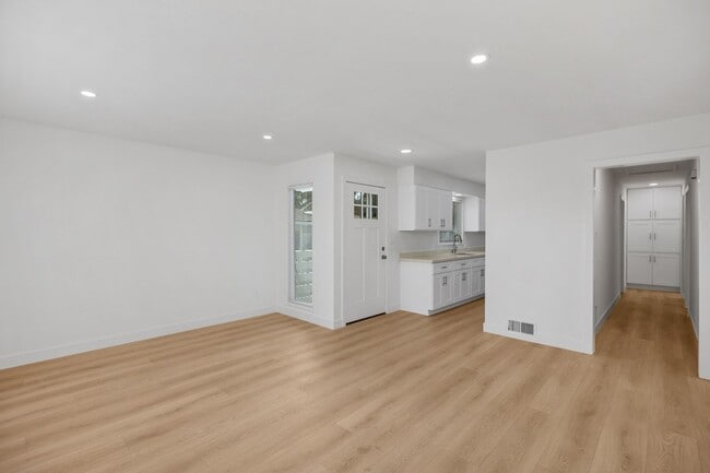 Building Photo - Coastal Living at Its Finest! Fully Remode...