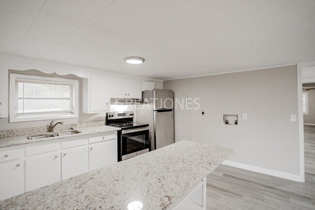 Building Photo - NOW OFFERING HALF OFF THE FIRST FULL MONTH...
