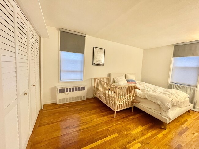 Bedroom w renovated closet. - 6311 Queens Blvd