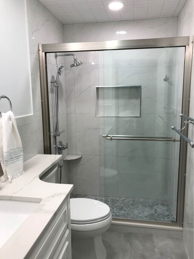 Marble walk-in shower - 203 Pavonia Ave