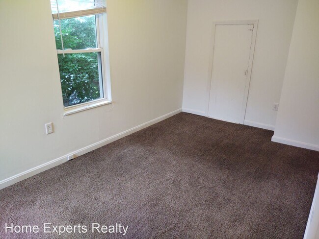 Foto del edificio - 1121-1123 N Lowry Ave