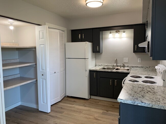 Cocina - Riverside Apartments and Townhomes