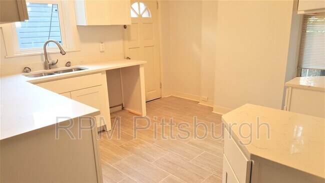 Building Photo - 305 Miltenberger St
