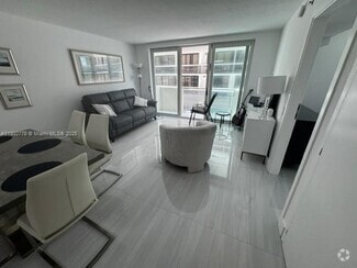 Building Photo - 9499 Collins Ave