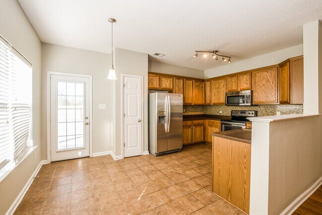Building Photo - 9934 White Poplar Dr