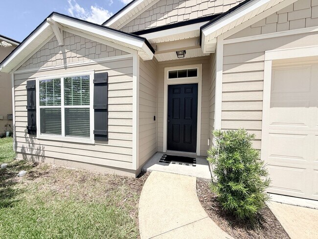 Building Photo - Spacious 4BR Home with Large Fenced Yard & Community Pool