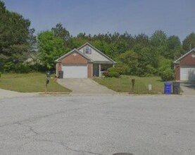Building Photo - 7910 Four Oaks Ct