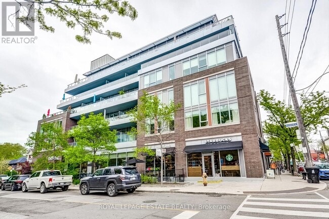 Building Photo - 1960 Queen St E